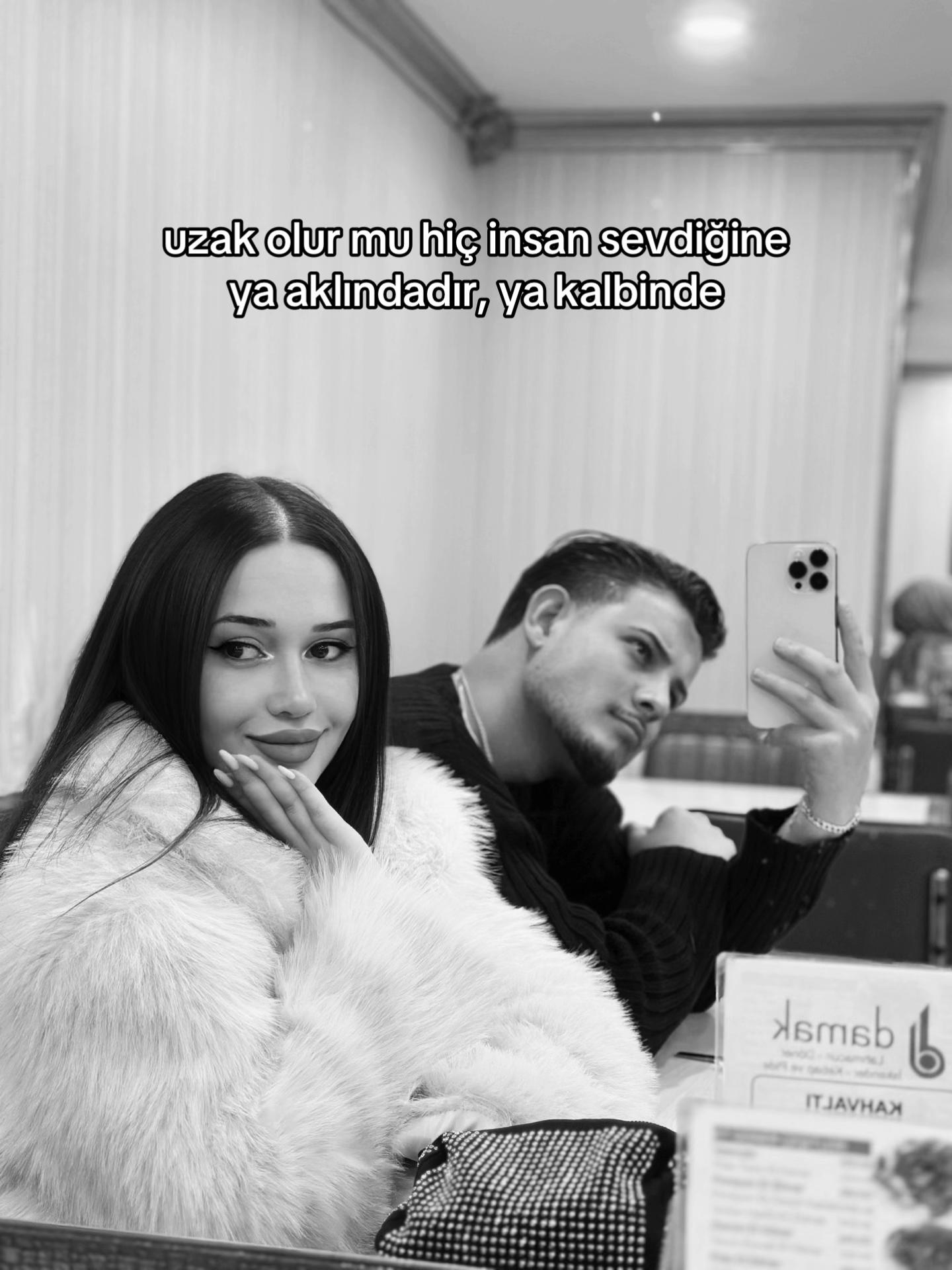 @E.