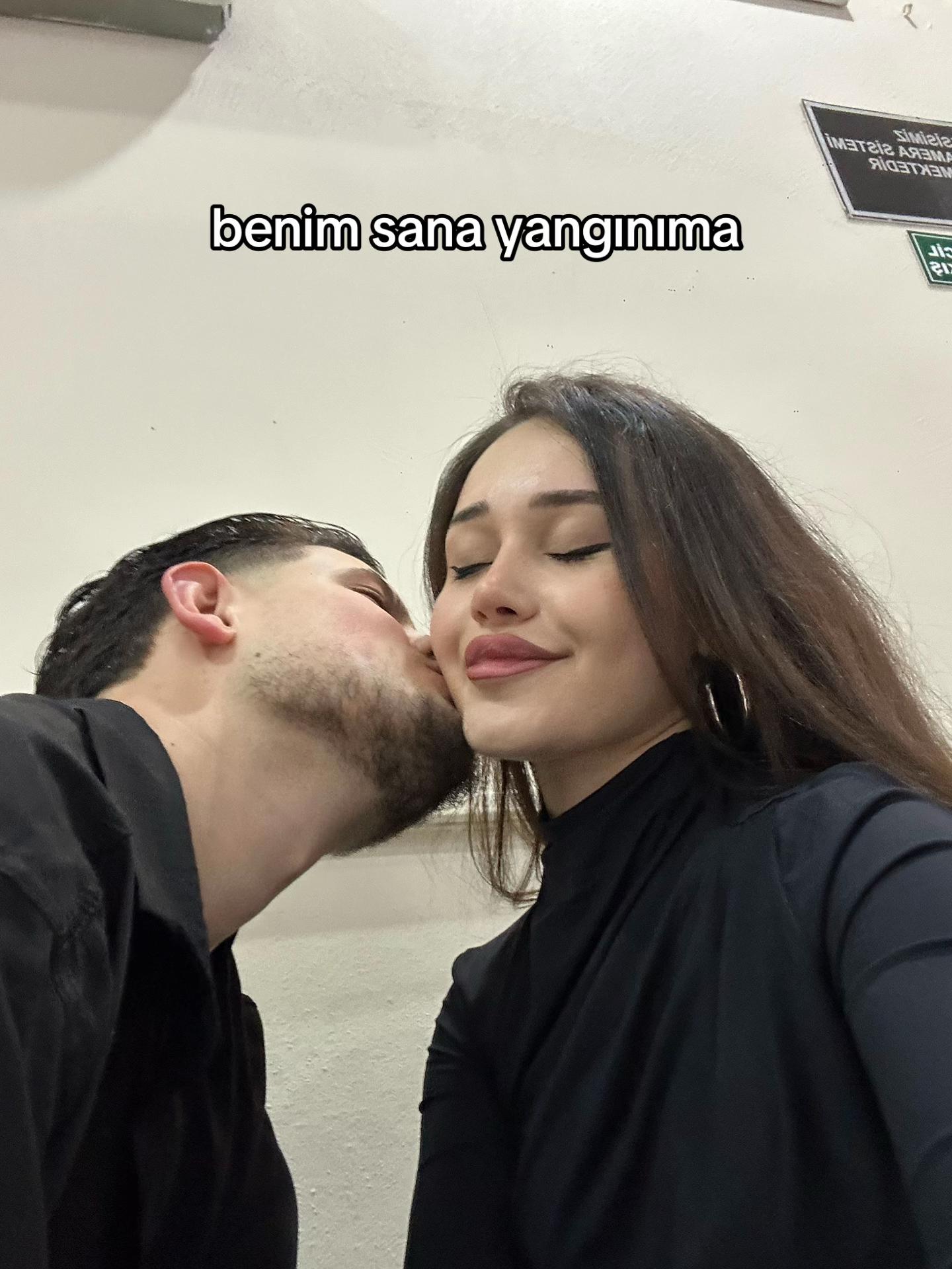 @E.