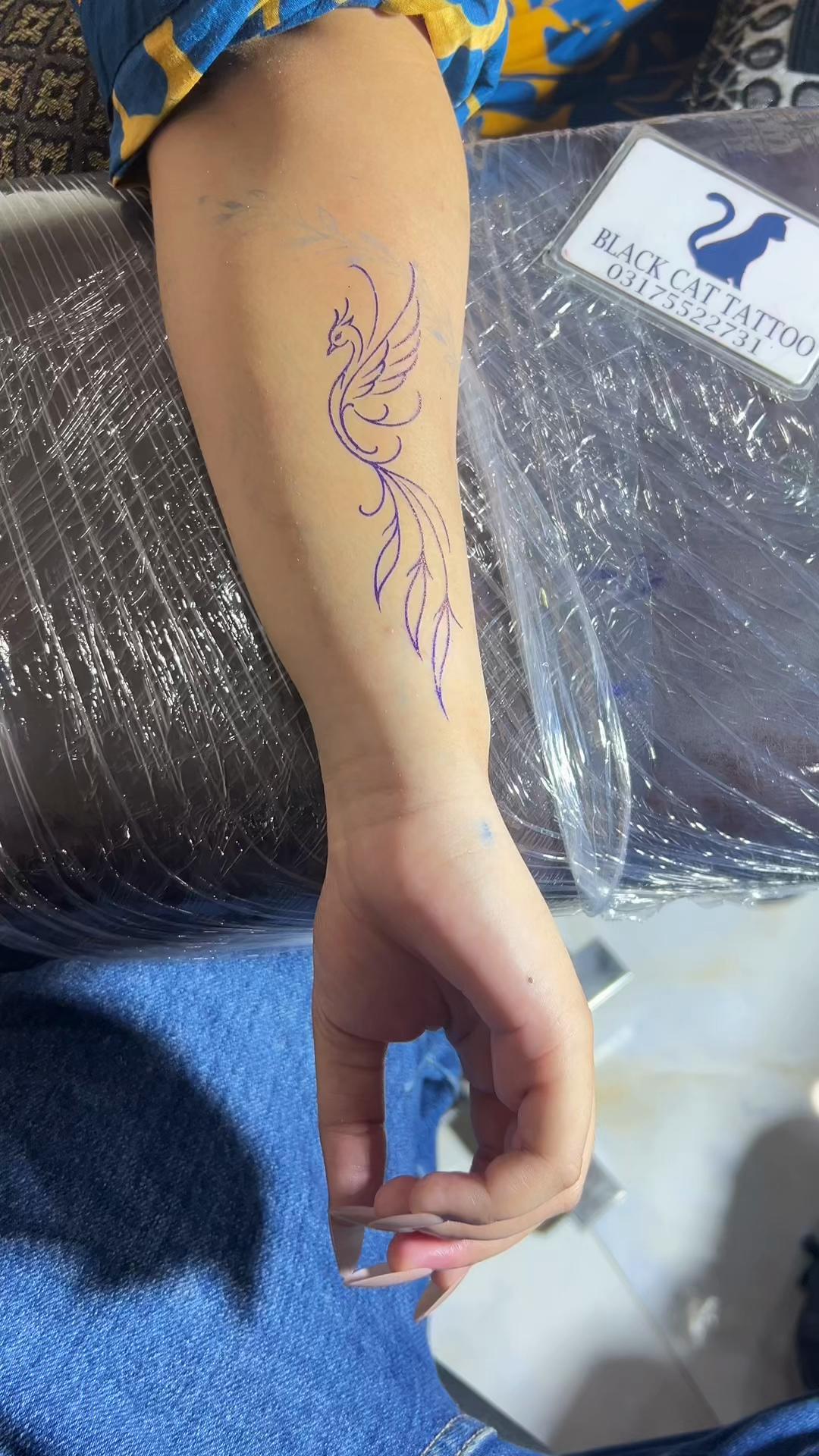 @Black cat Tatoo