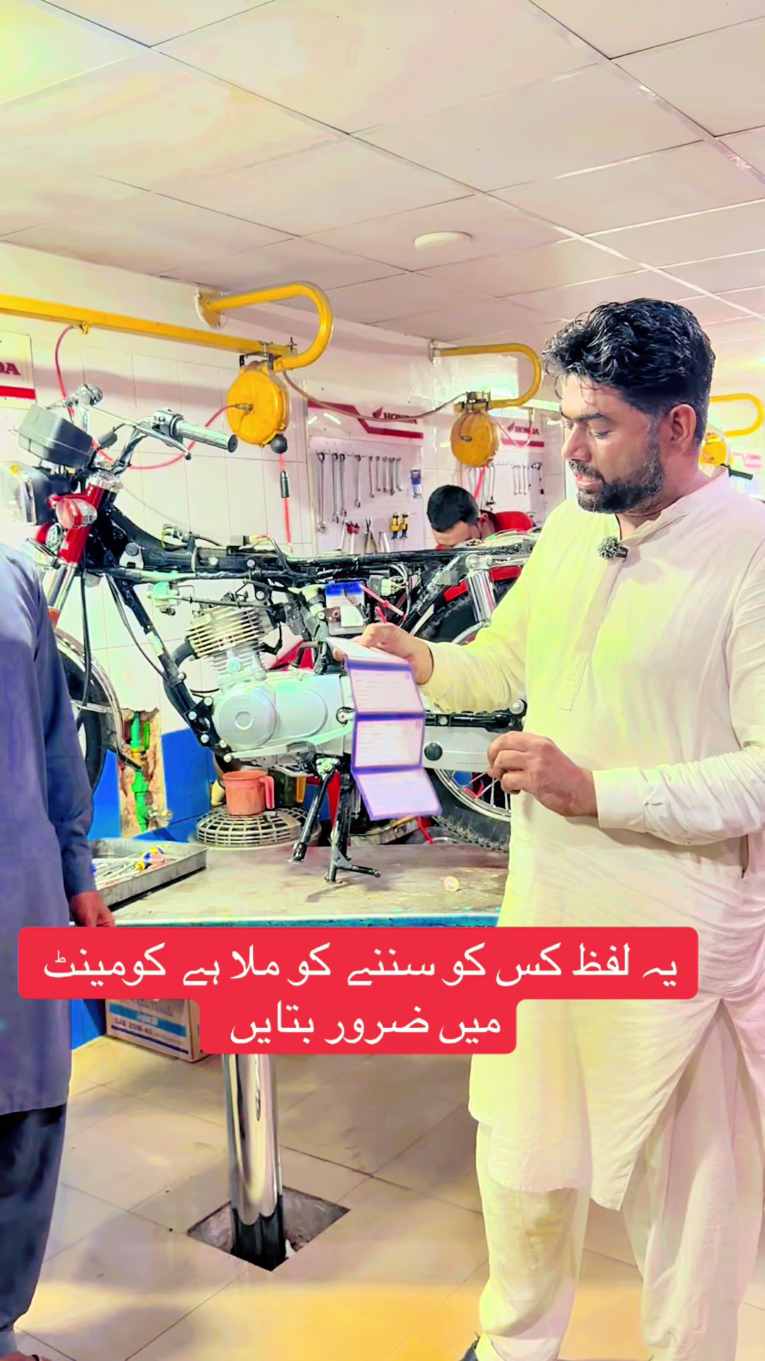 @Honda workshop officials