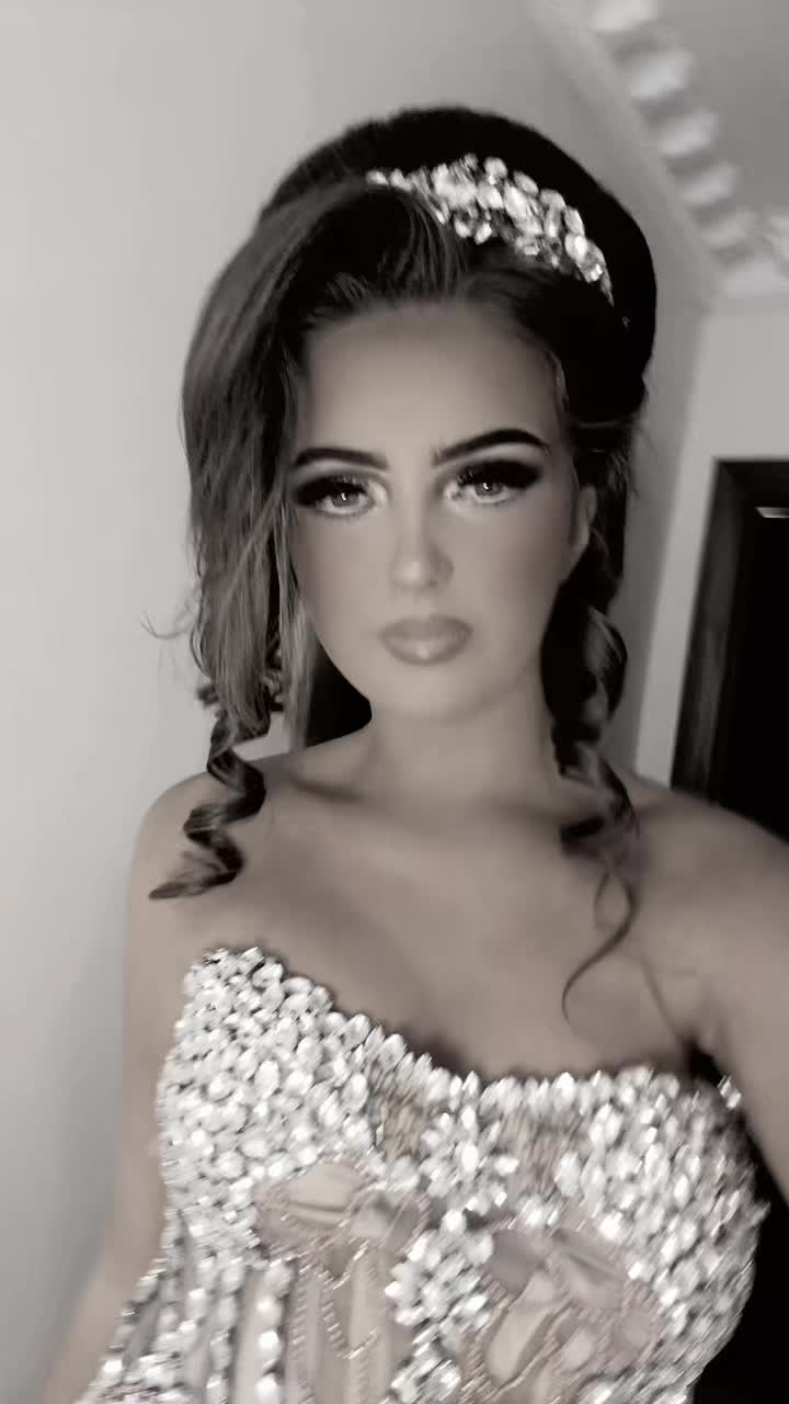 @~J~