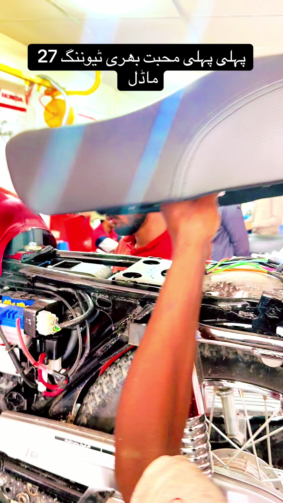 @Honda workshop officials