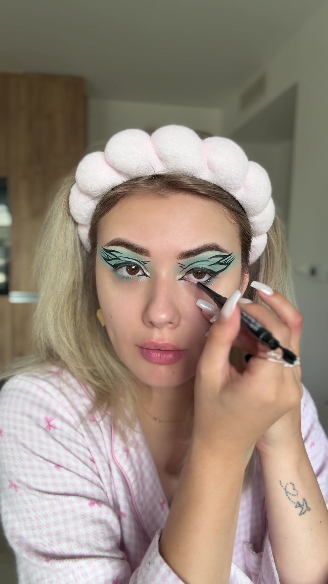 @tixyca