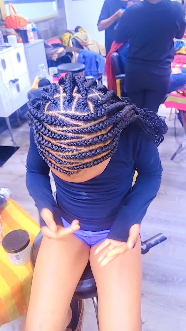 @African Genesis Hair Baba