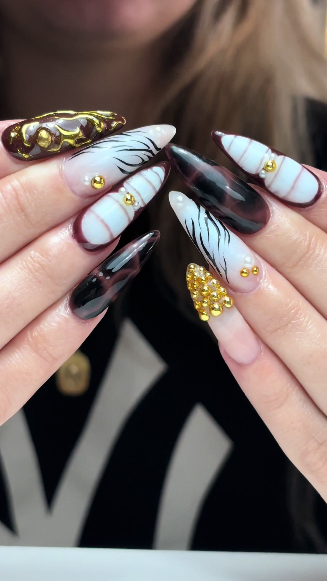 @minadamnnailz