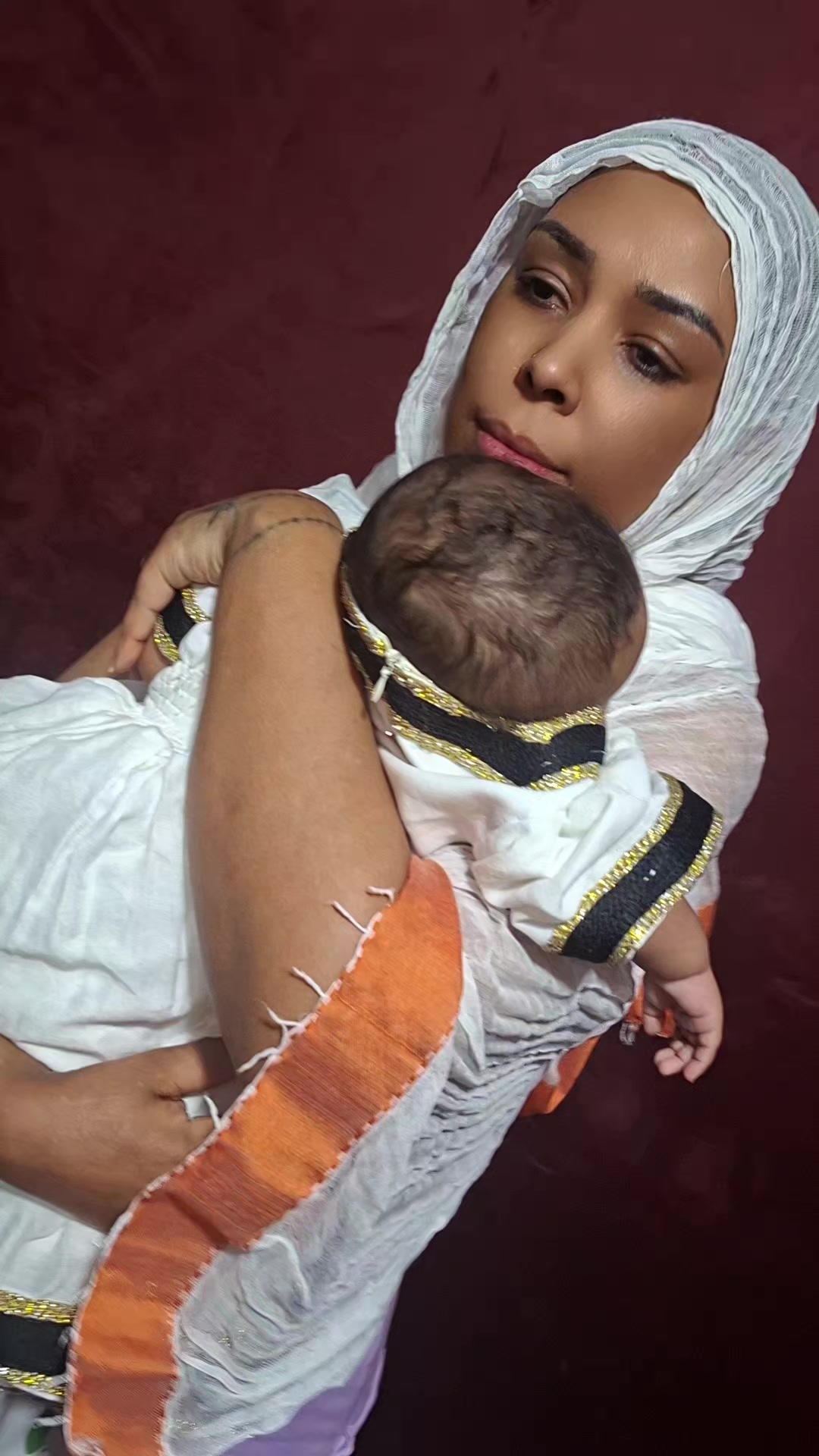 @ገኒ አልባሳት