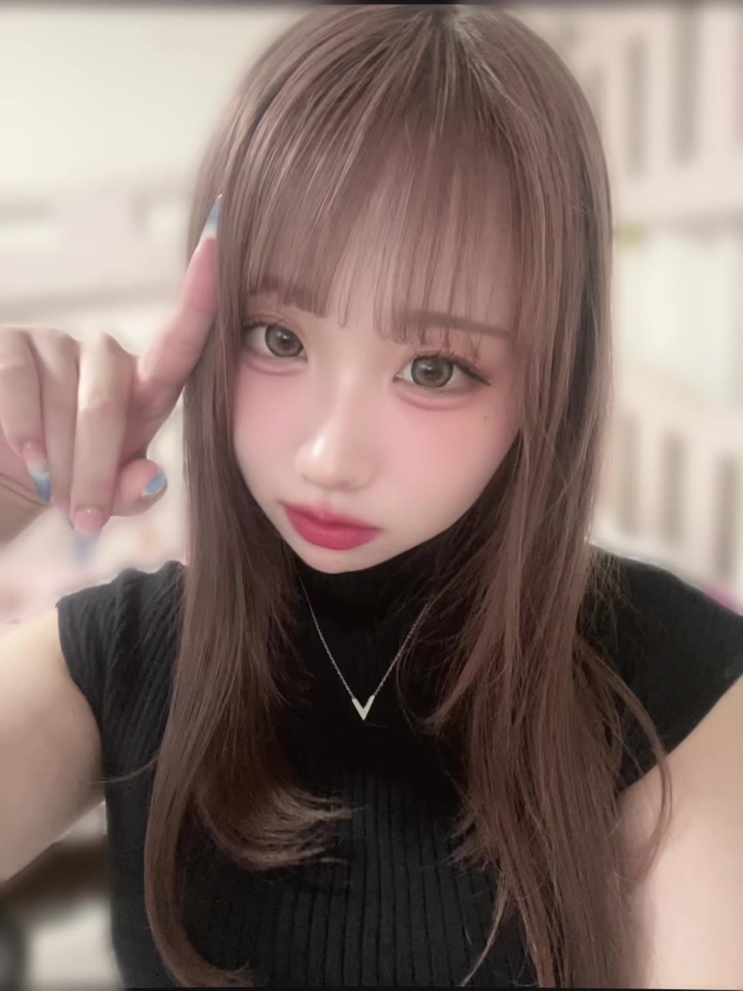 @にこ