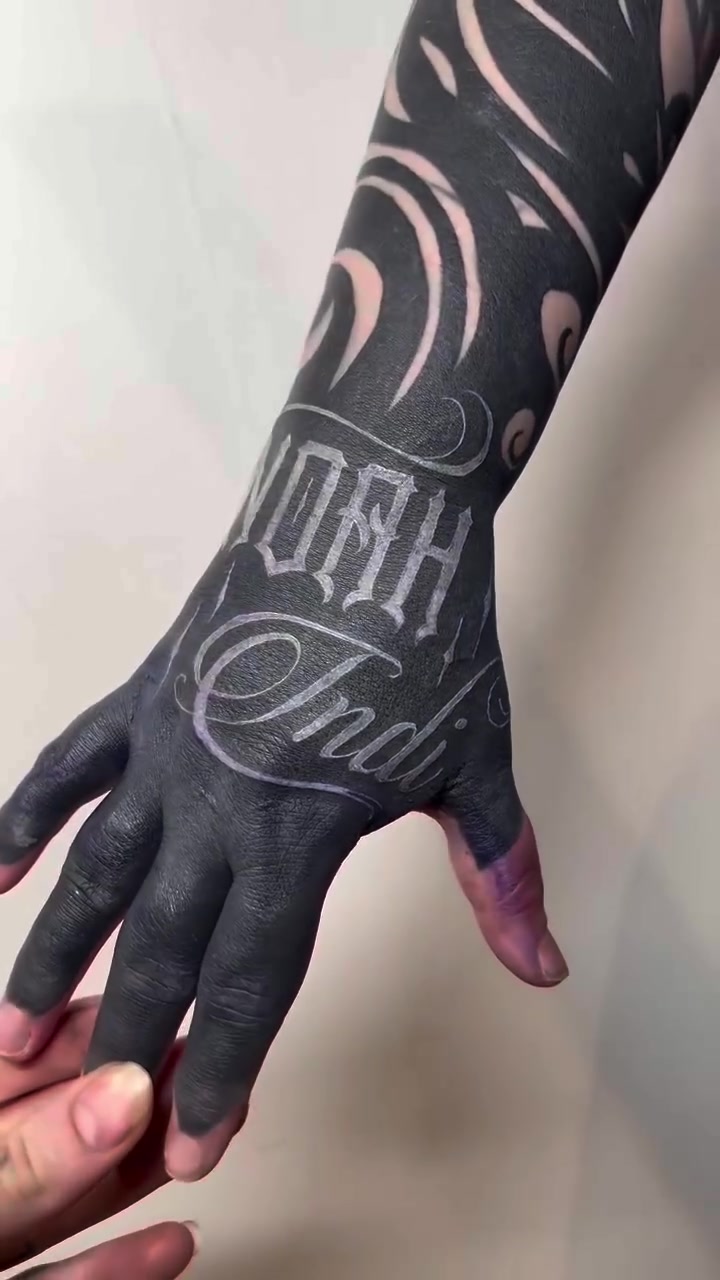 @WHITE ON BLACK TATTOO