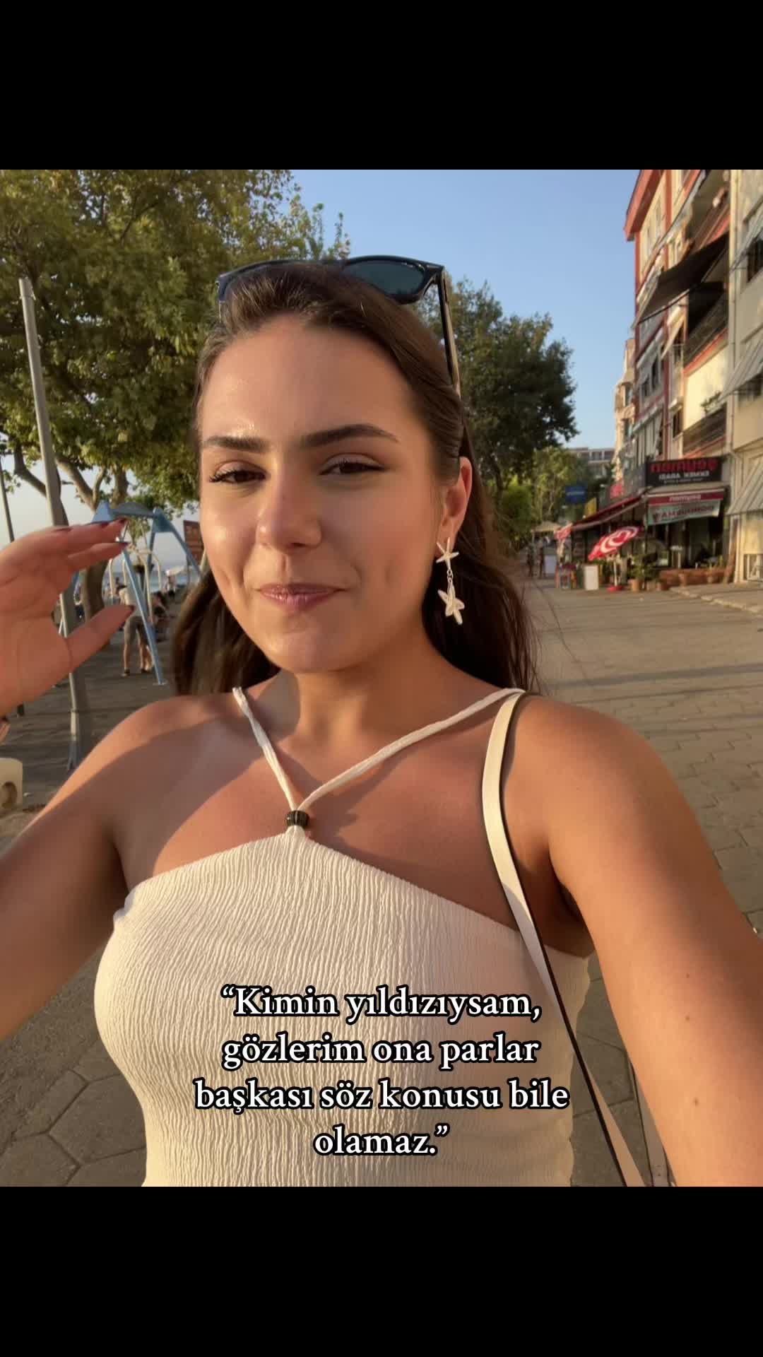 @~E~
