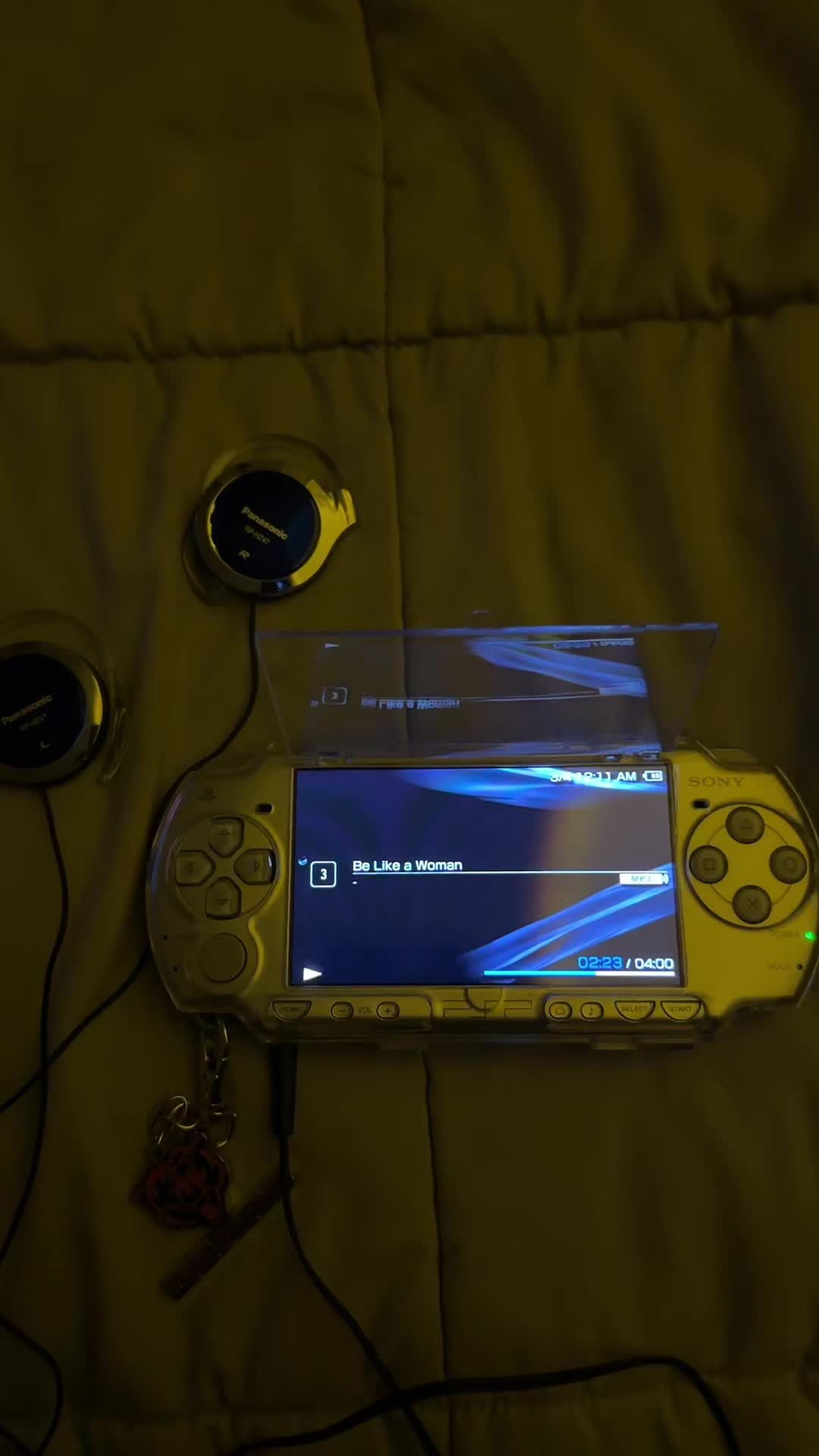 @~J~