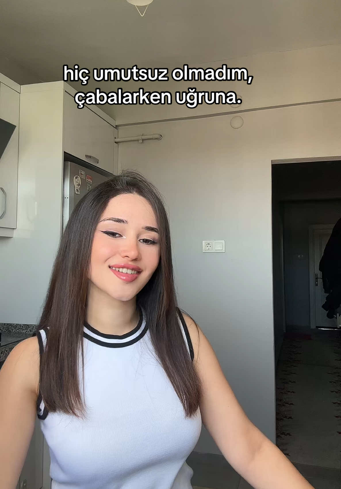 @E.