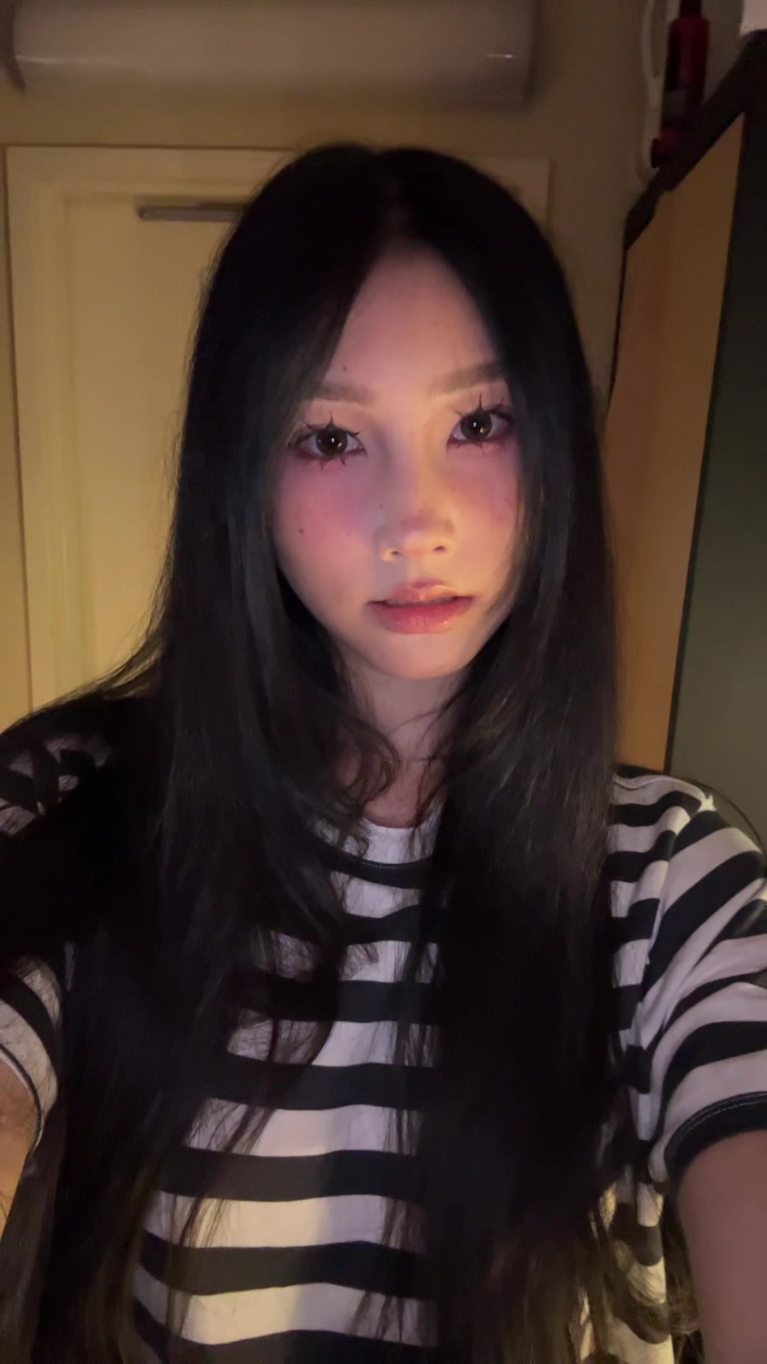 @笑里