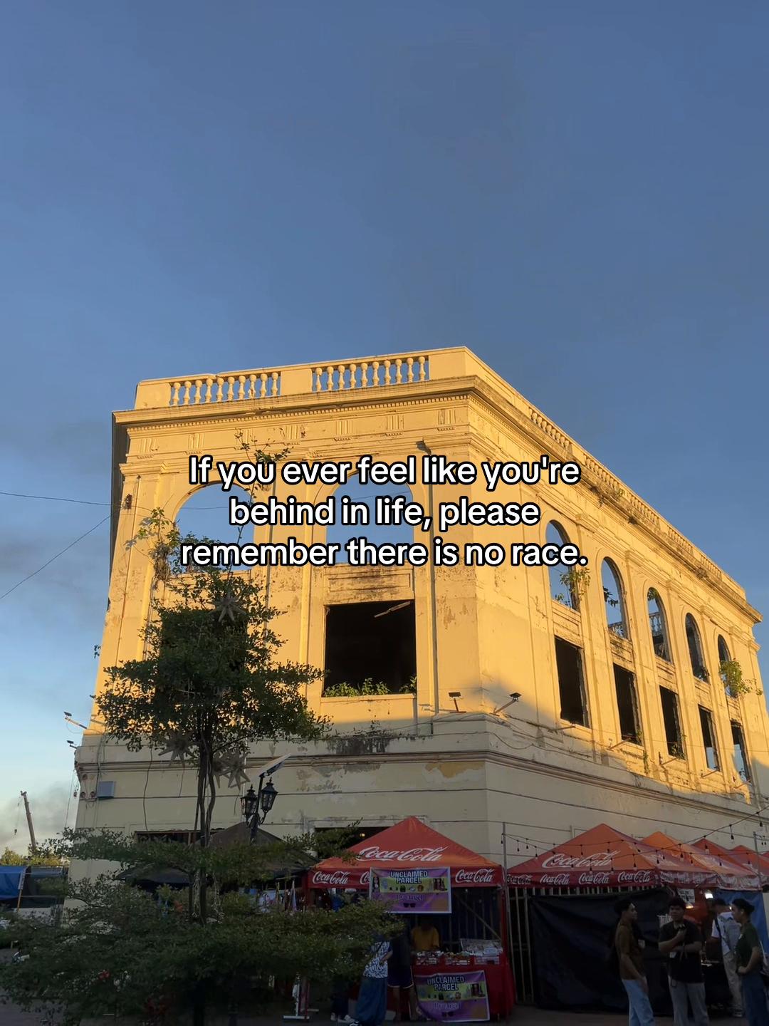 @:<