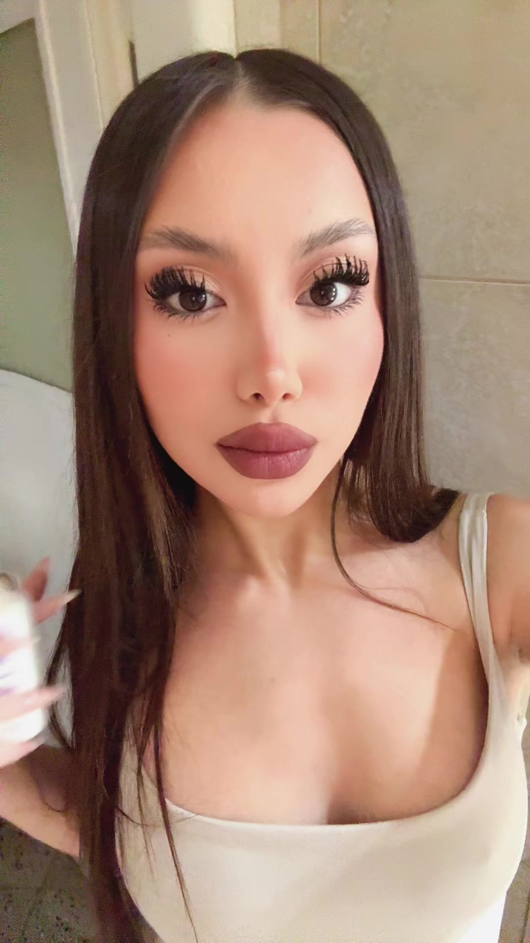 @T A N I A