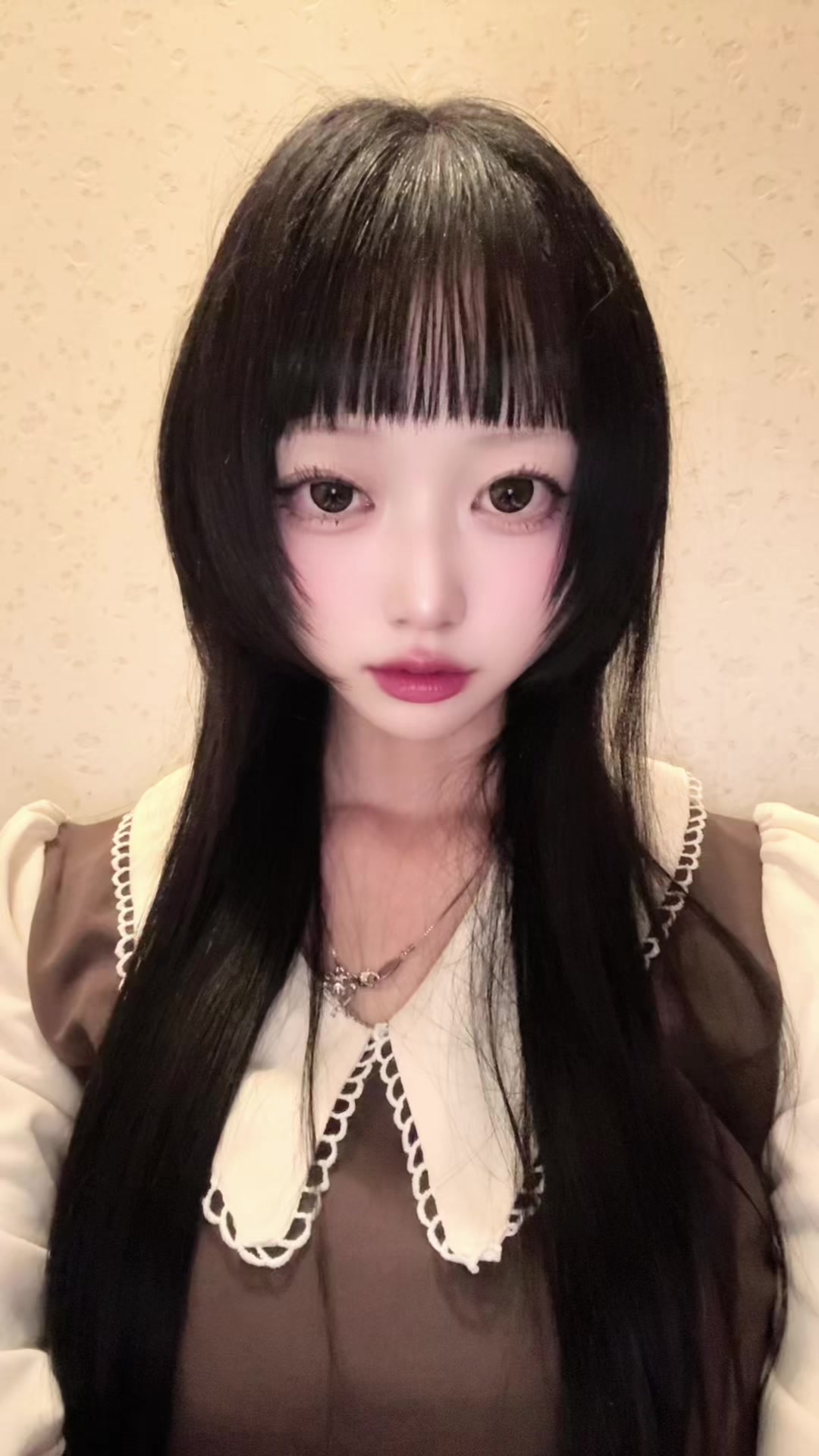 @か