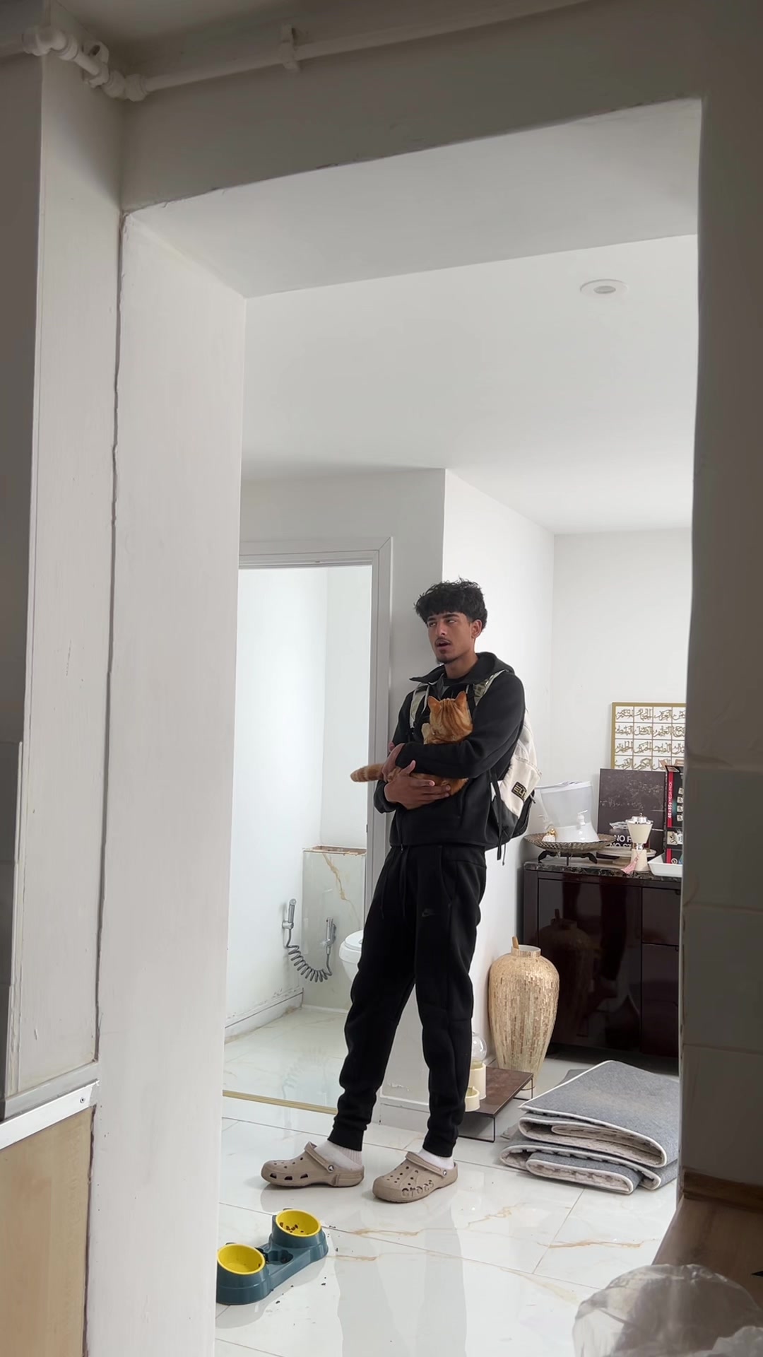 @S.