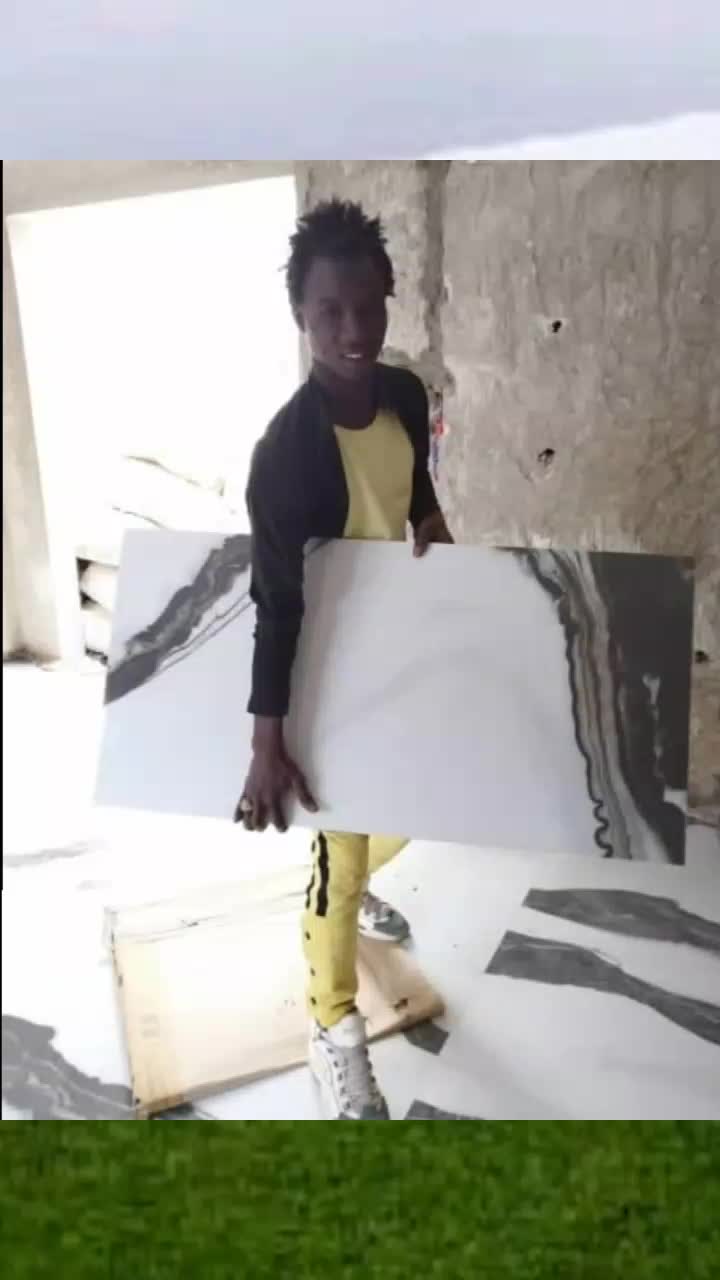 @Mbaye carreleur