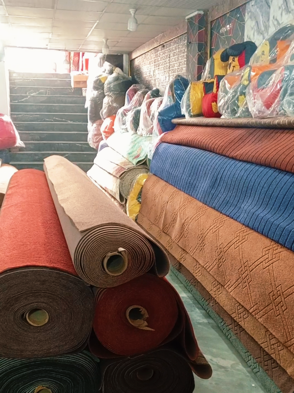 @KHAN Carpets and Rugs