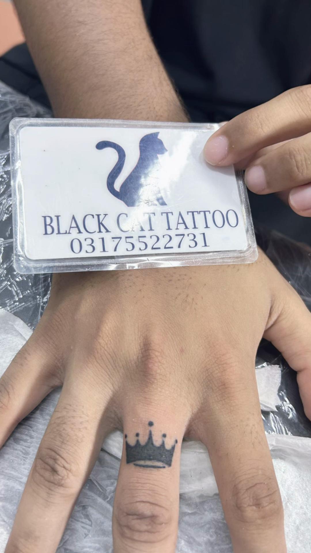 @Black cat Tatoo