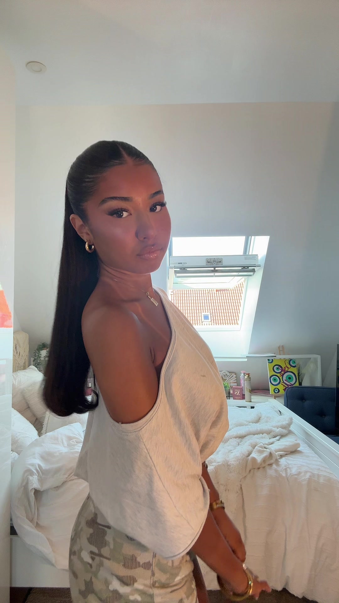 @E.