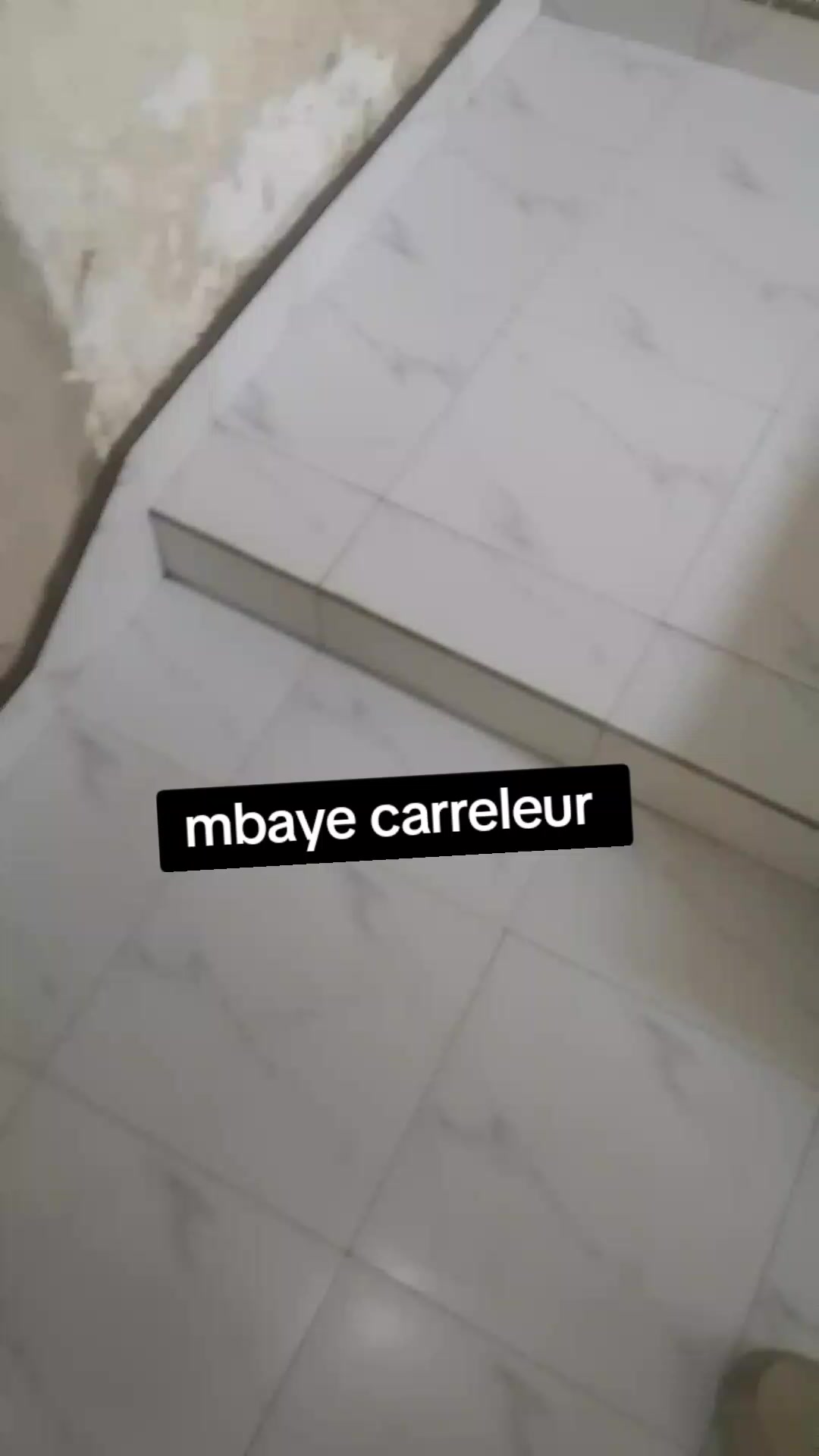 @Mbaye carreleur