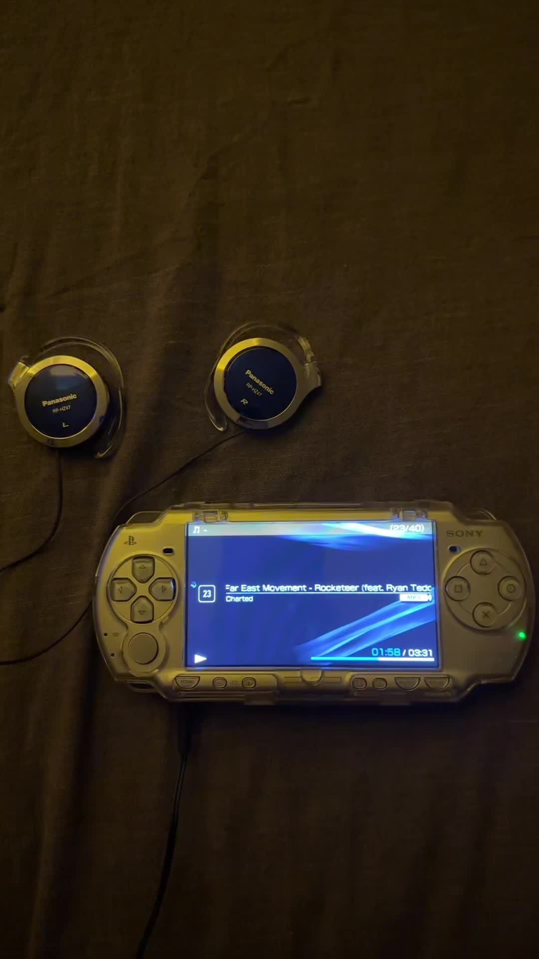 @~J~