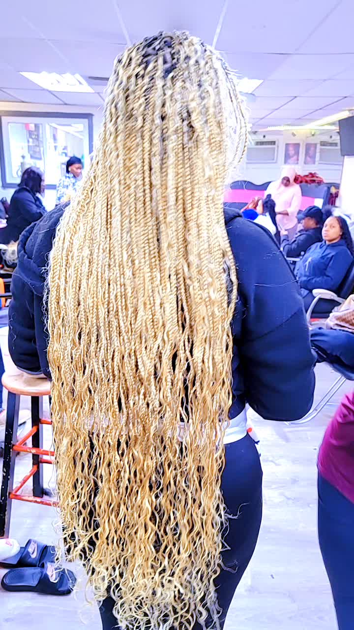 @African Genesis Hair Baba