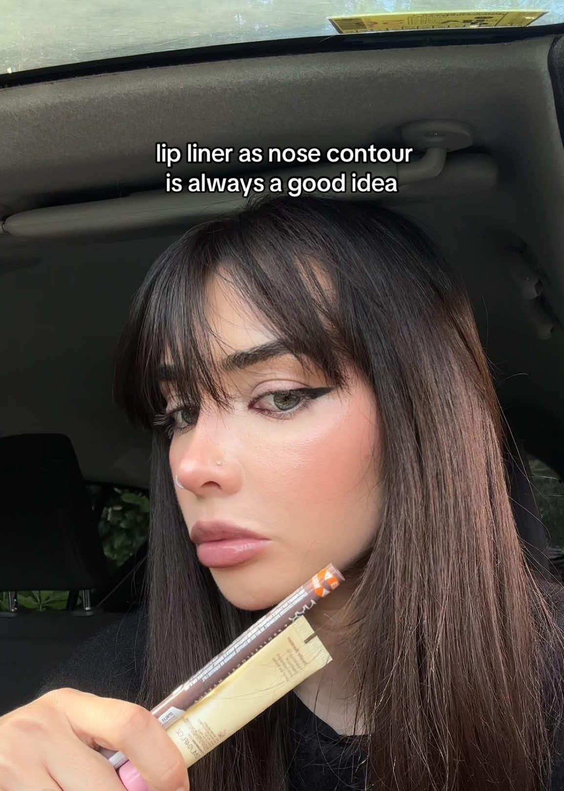@~ V