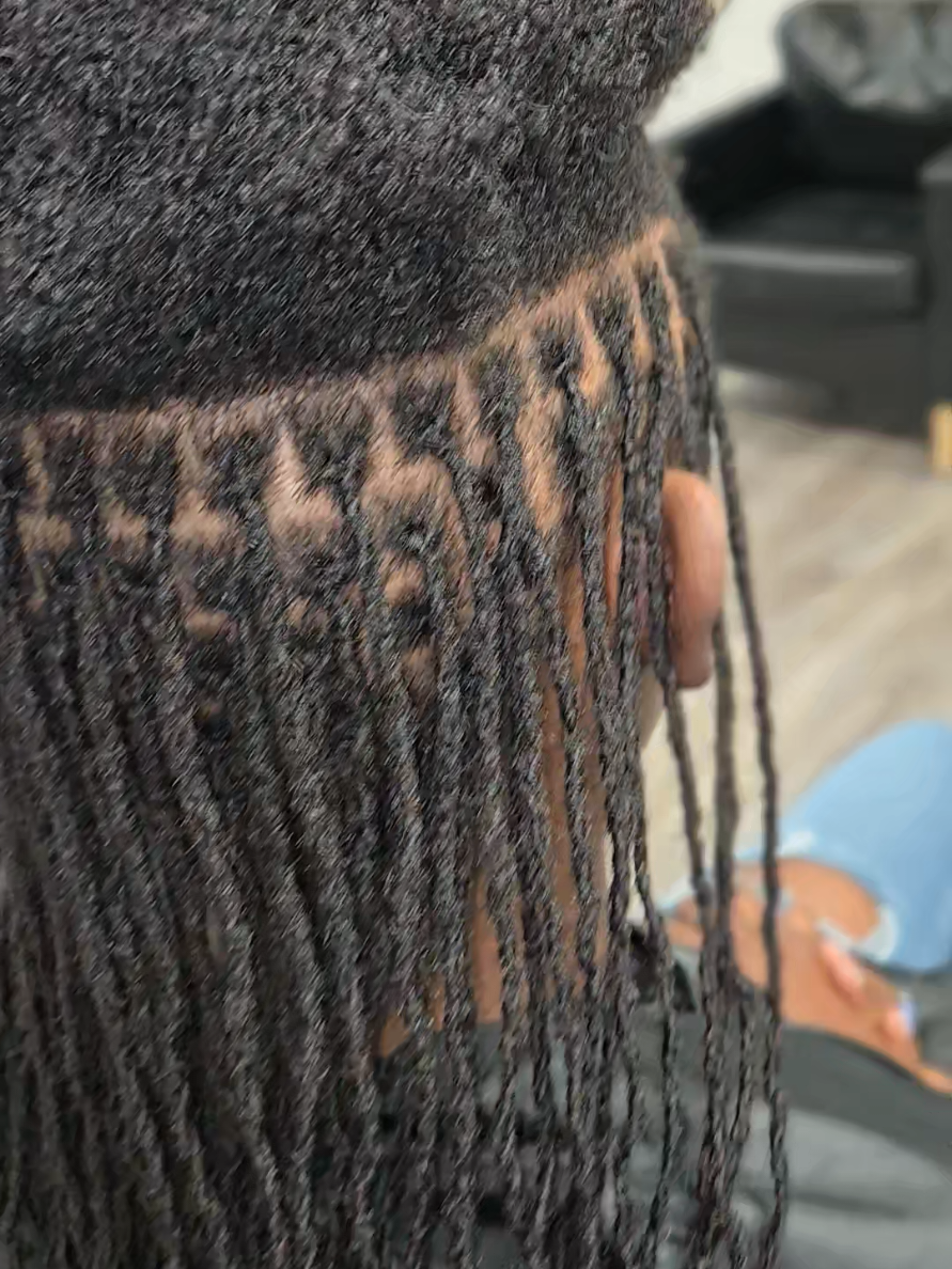 @Mukisa Locs