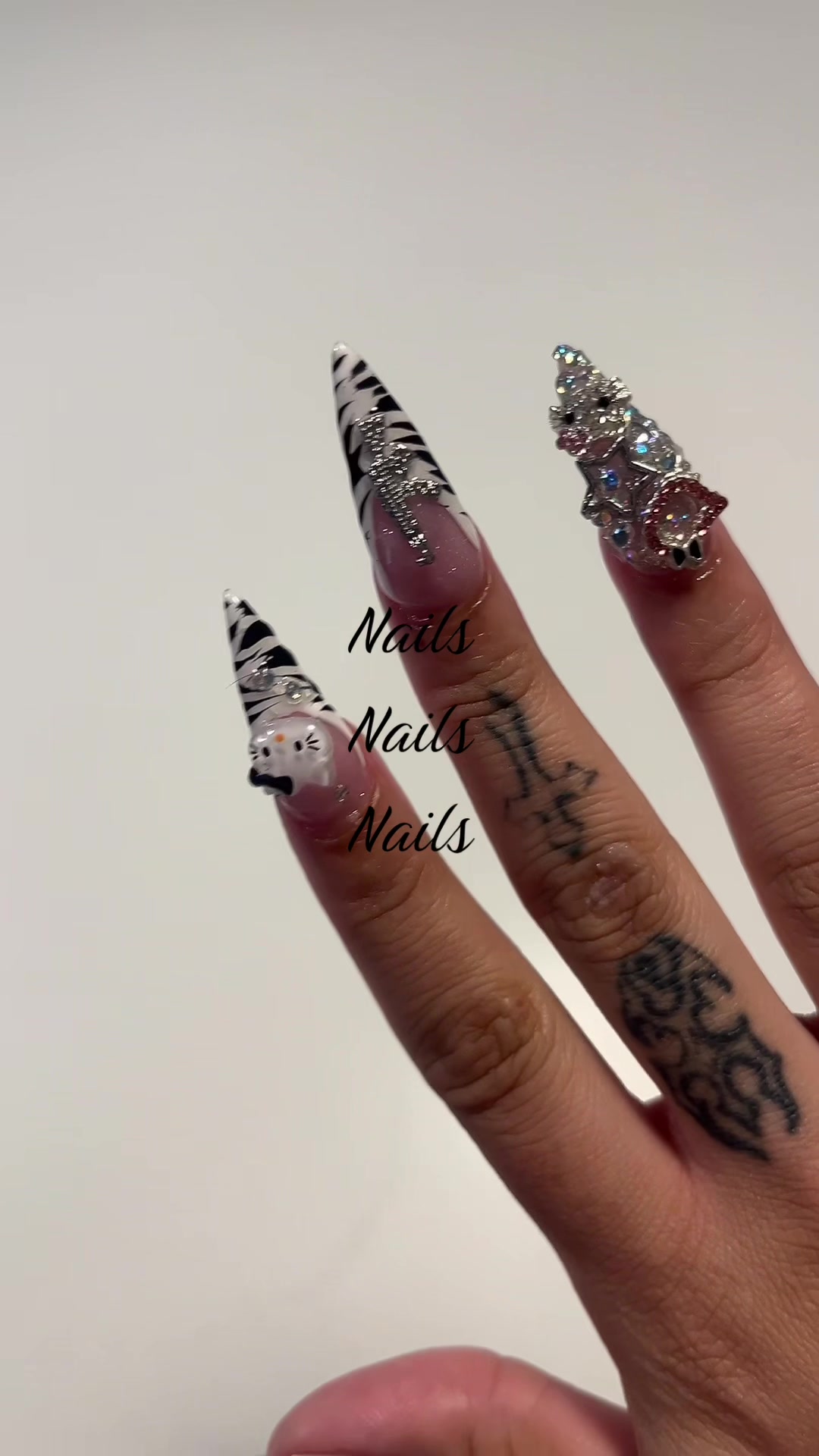 @nailsforangelz