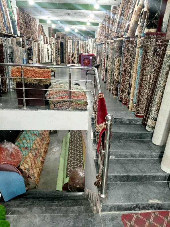 @KHAN Carpets and Rugs