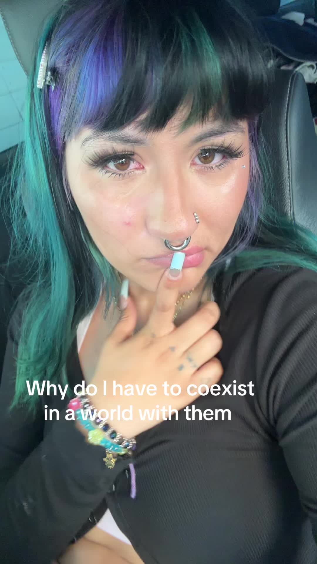 @:(