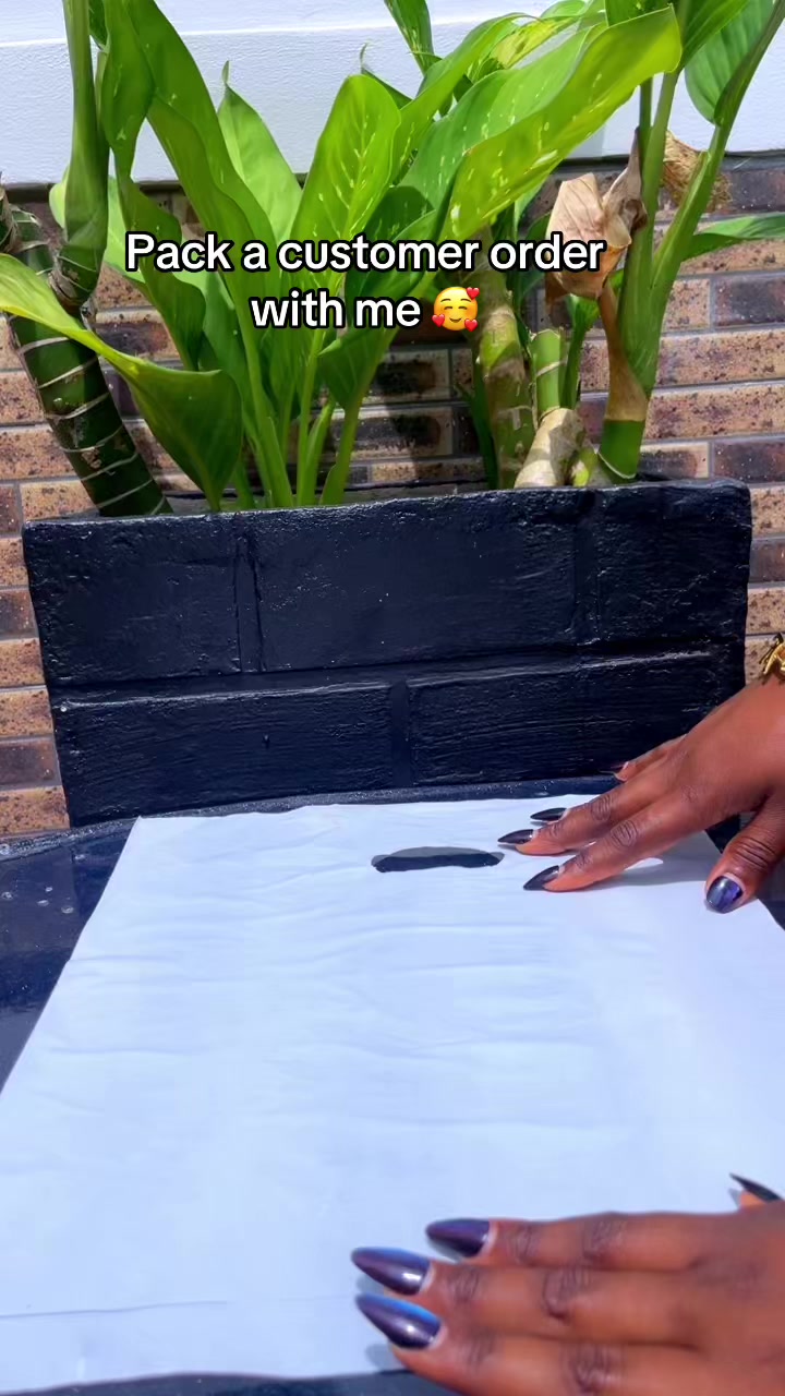 @Perfume, watch vendor in Uyo