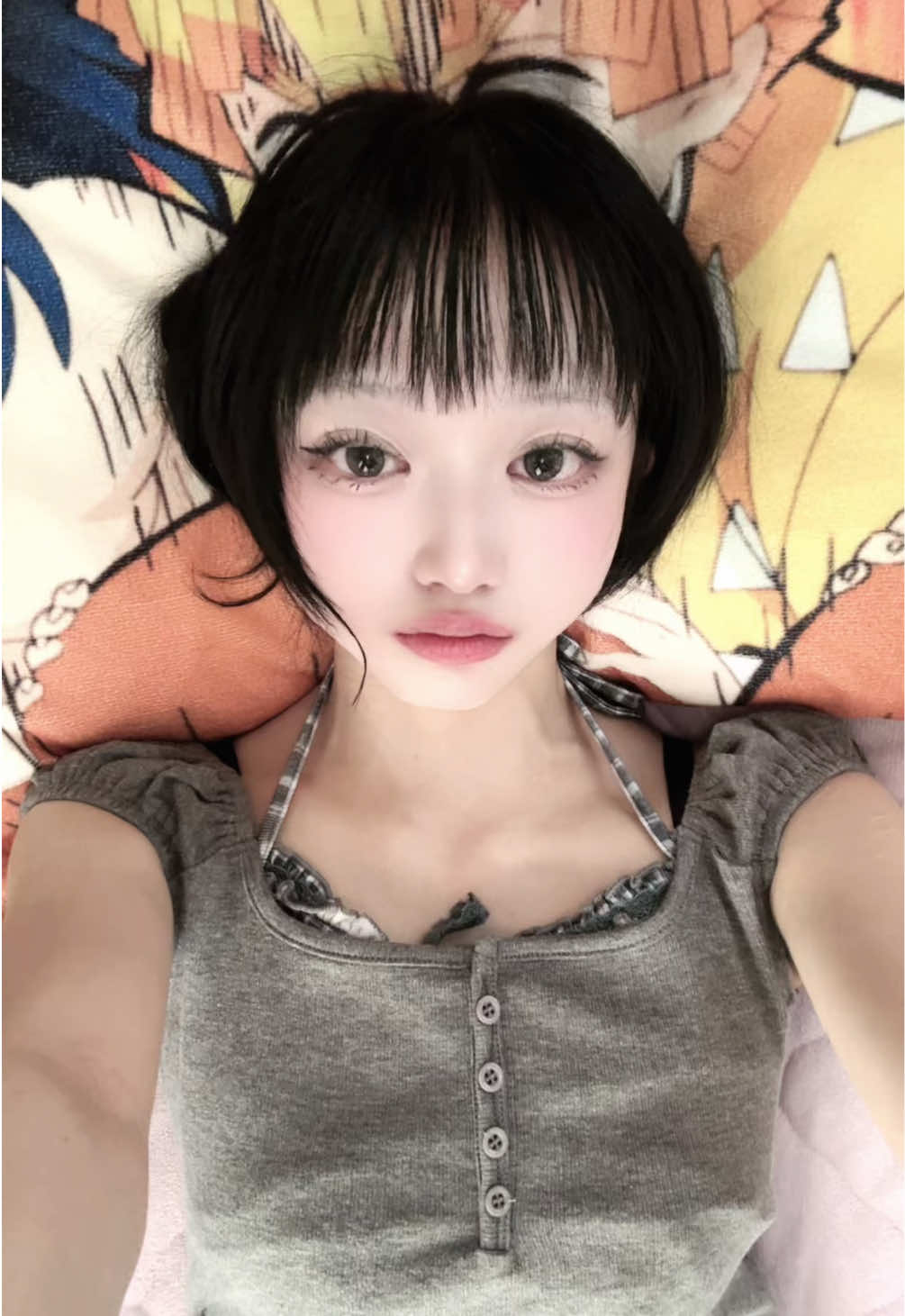 @か