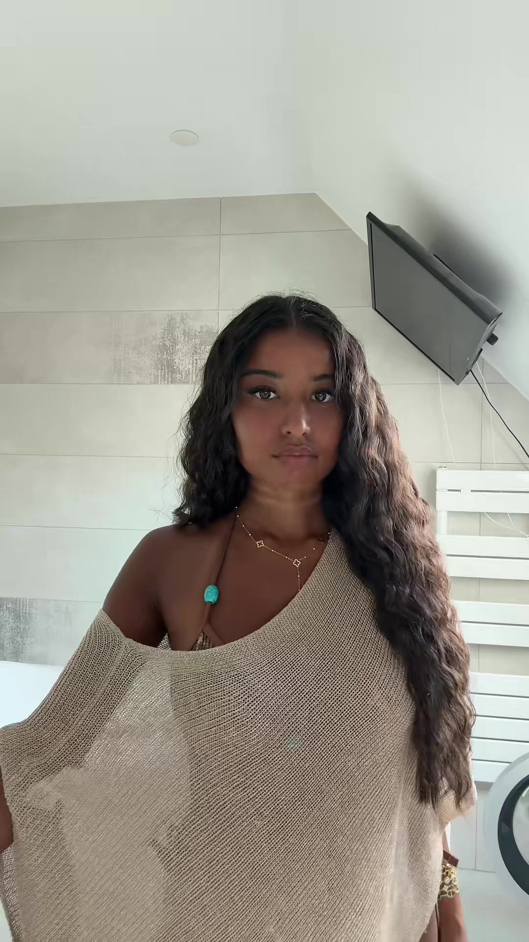 @E.