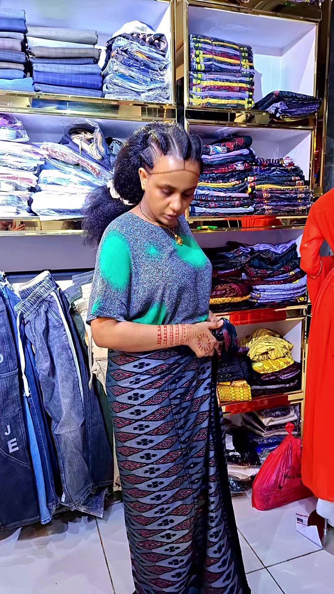 @ገኒ አልባሳት