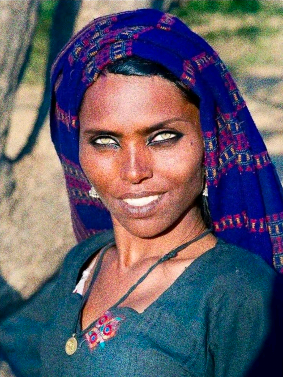 @;