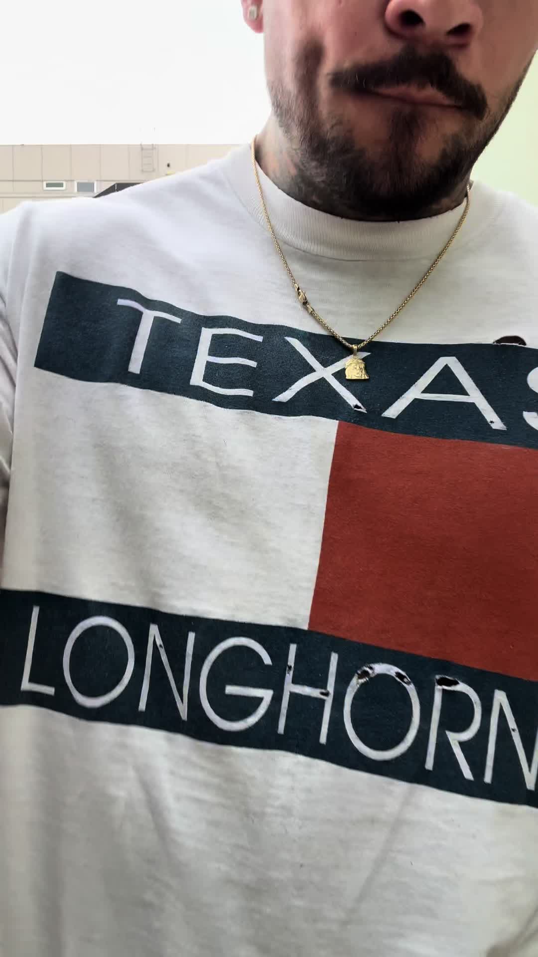 @E.