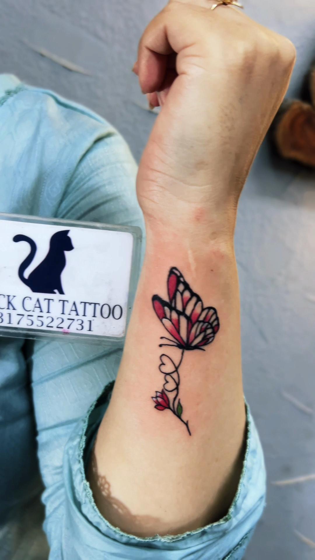 @Black cat Tatoo