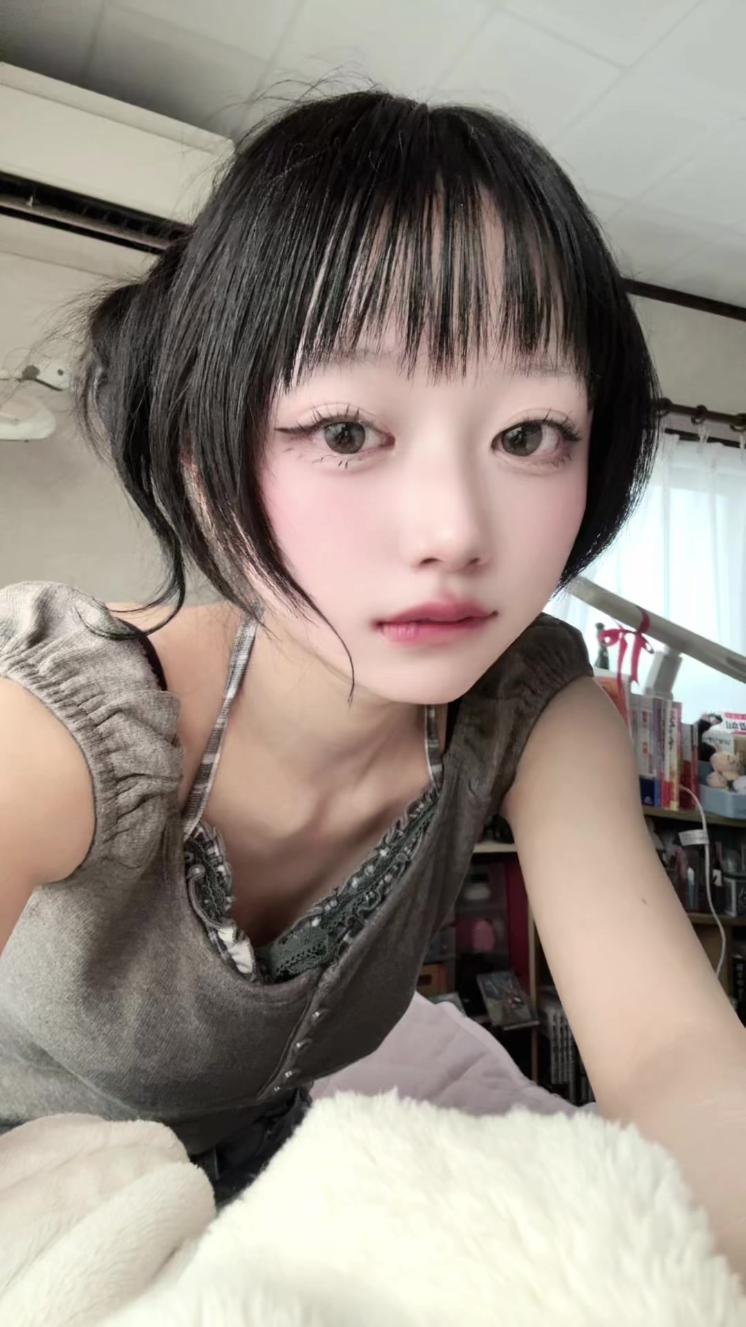 @か