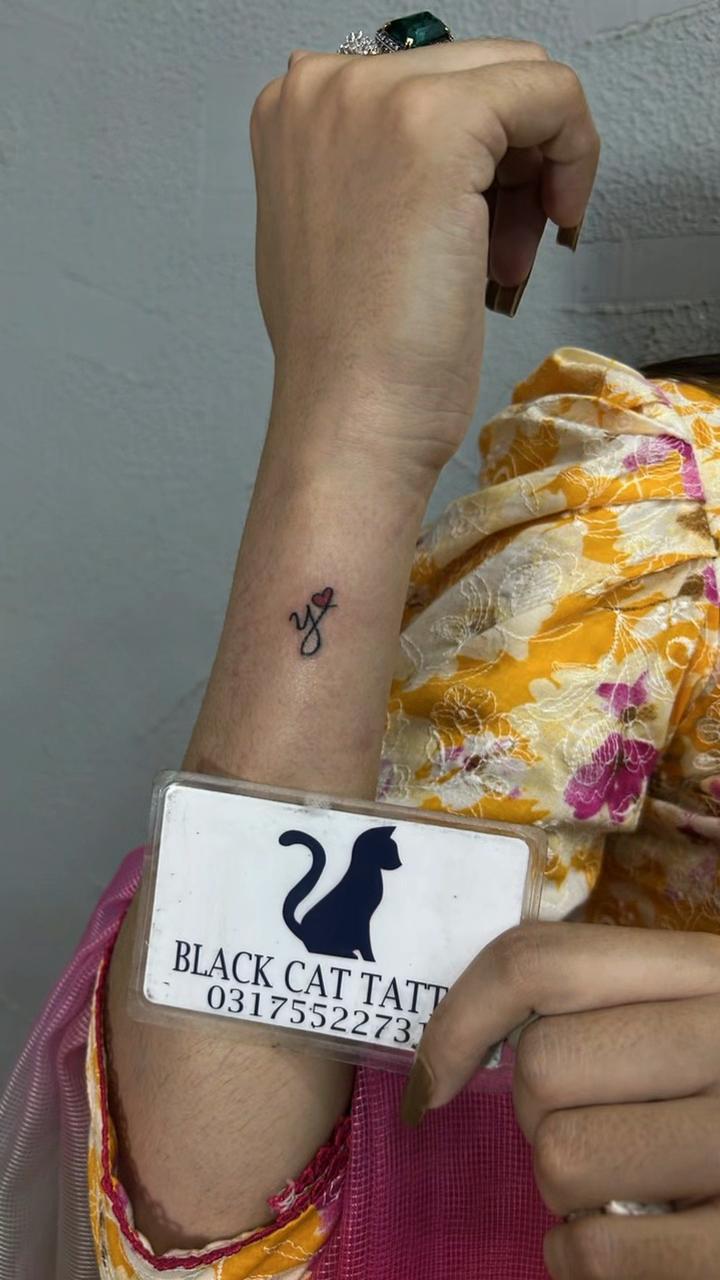 @Black cat Tatoo