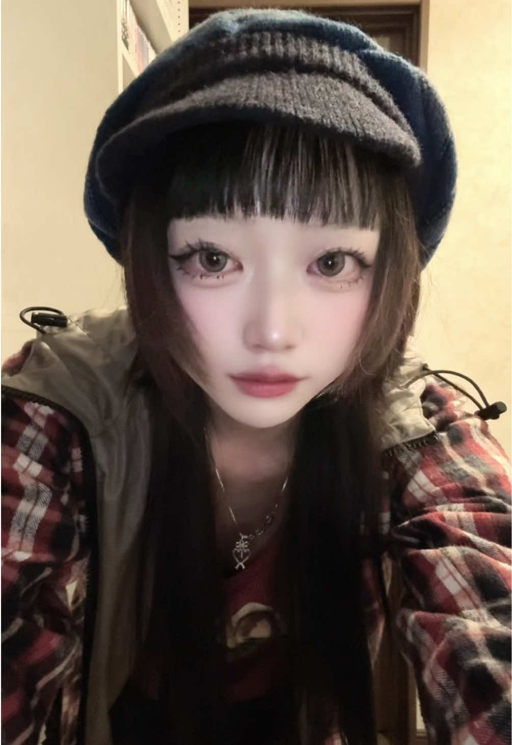 @か