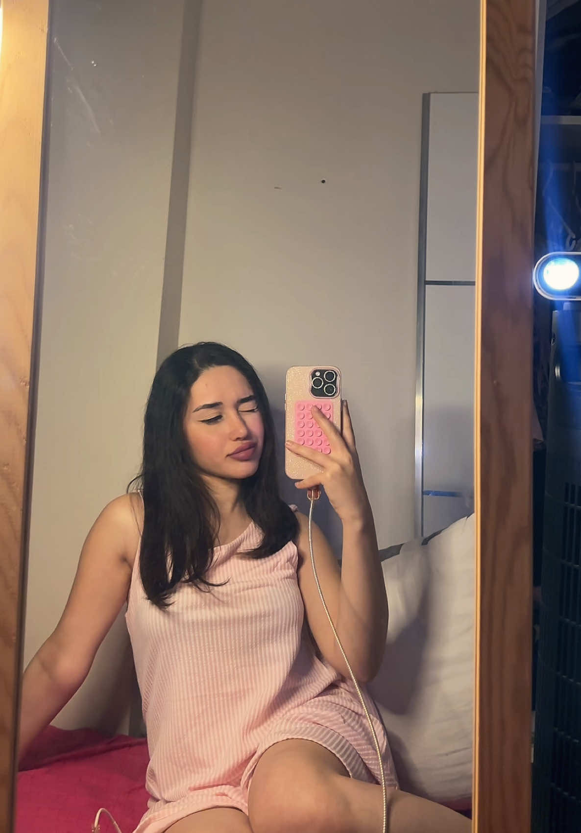 @E.