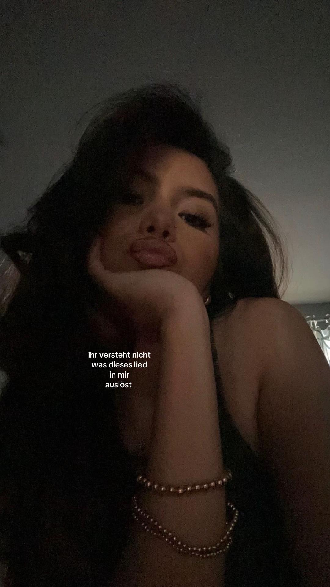 @⁻
