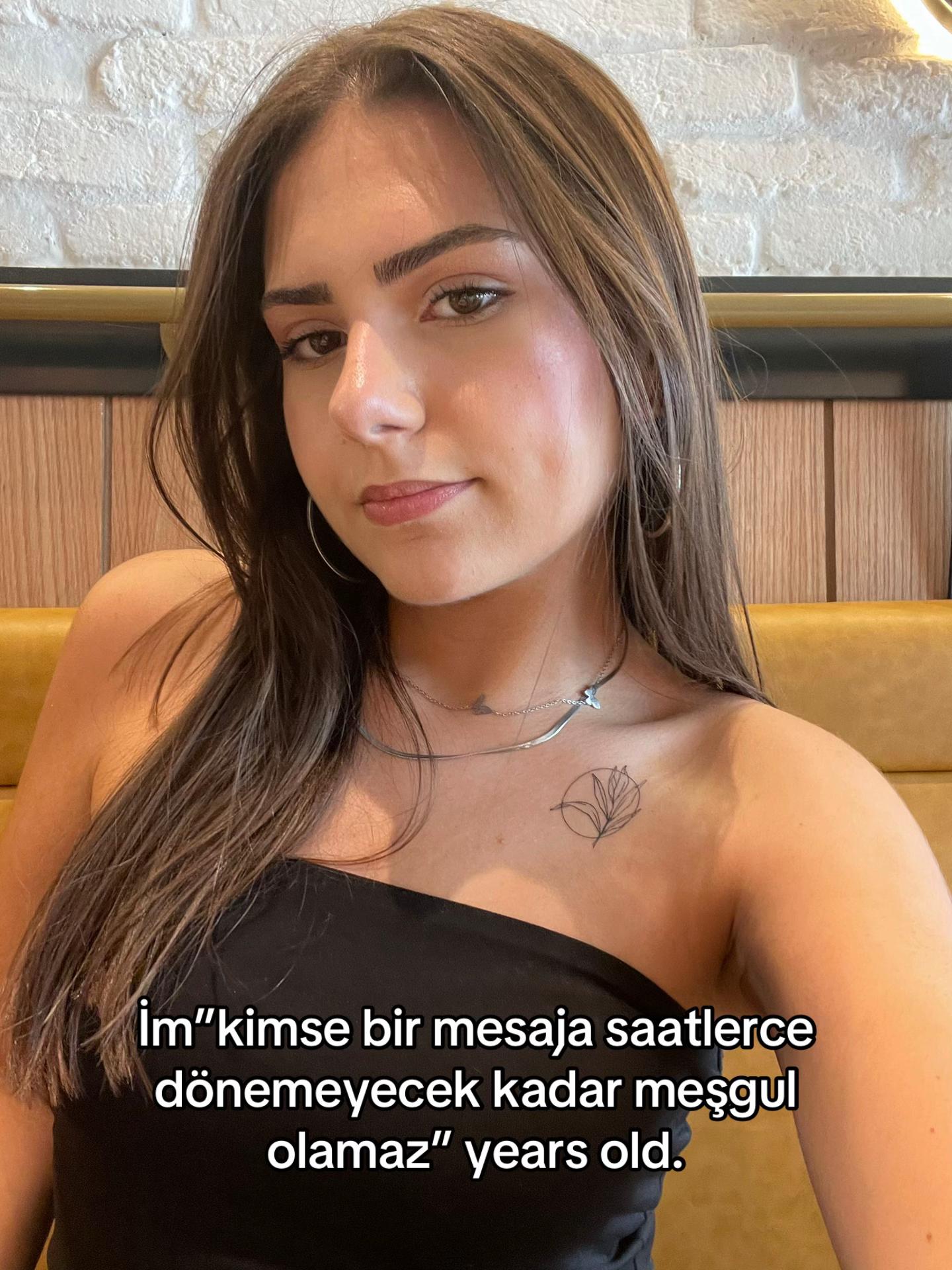 @~E~