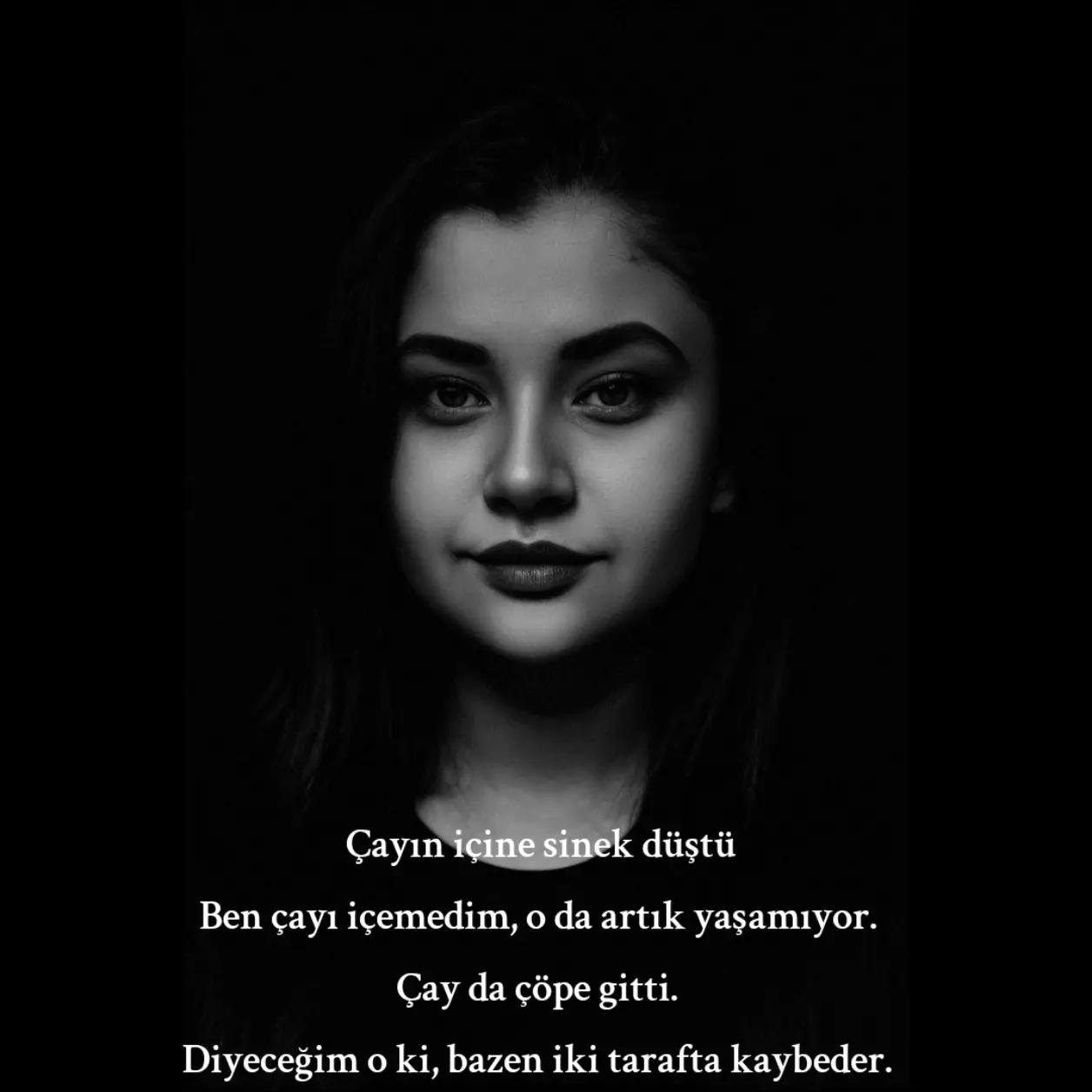 @~GNK