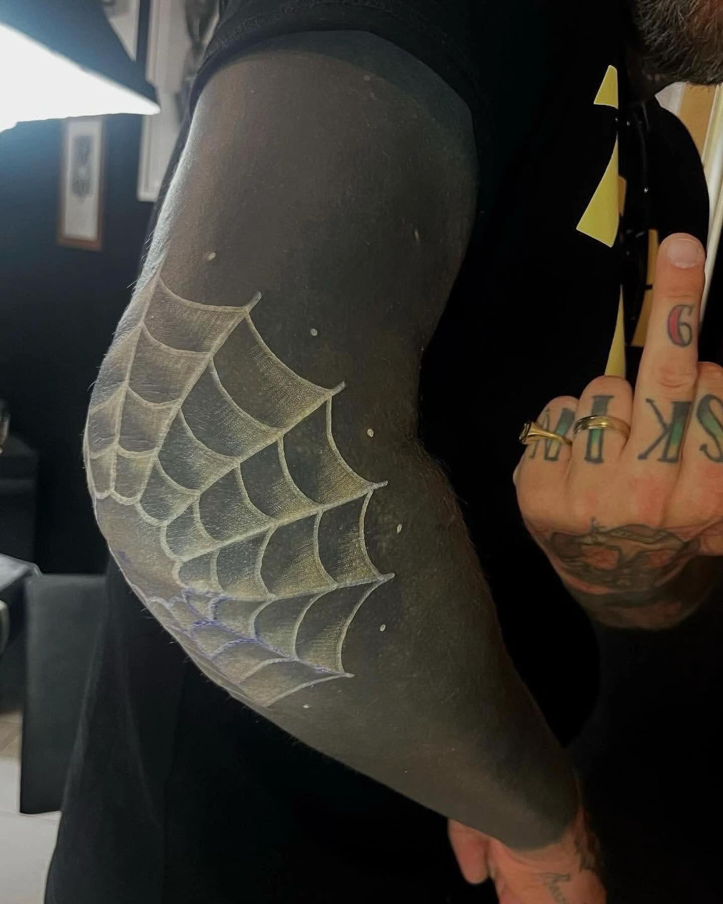 @WHITE ON BLACK TATTOO