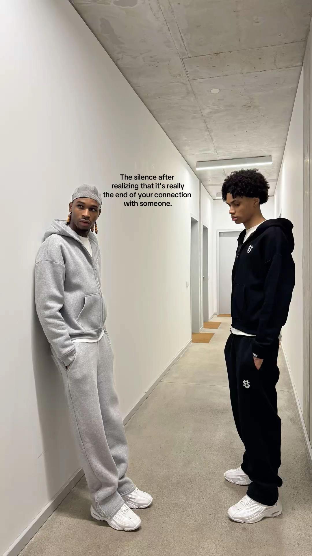 @⁻