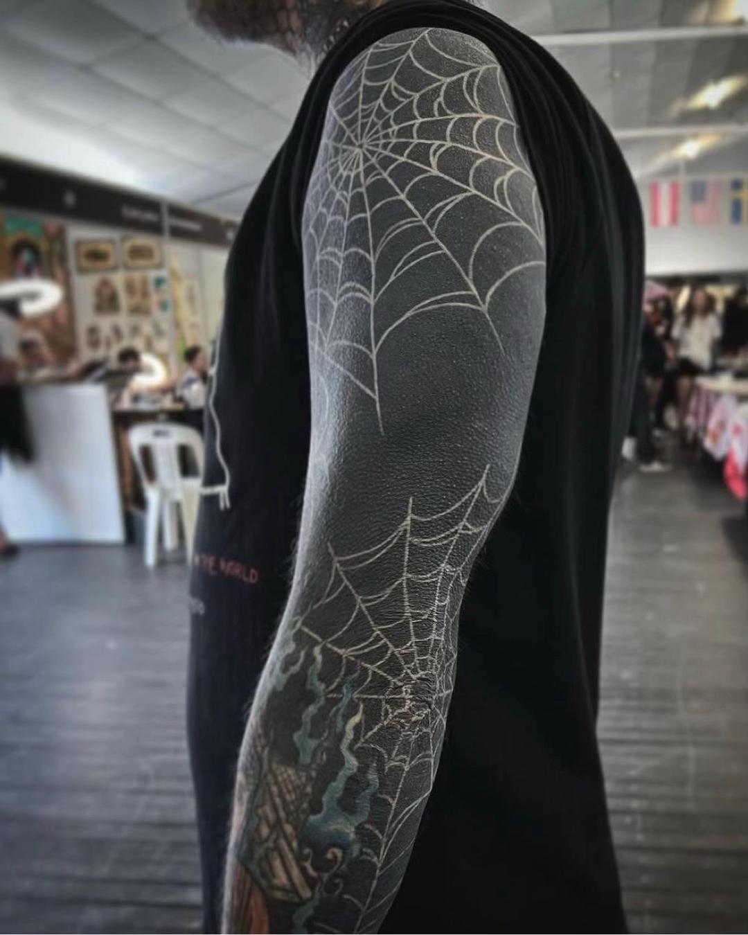 @WHITE ON BLACK TATTOO
