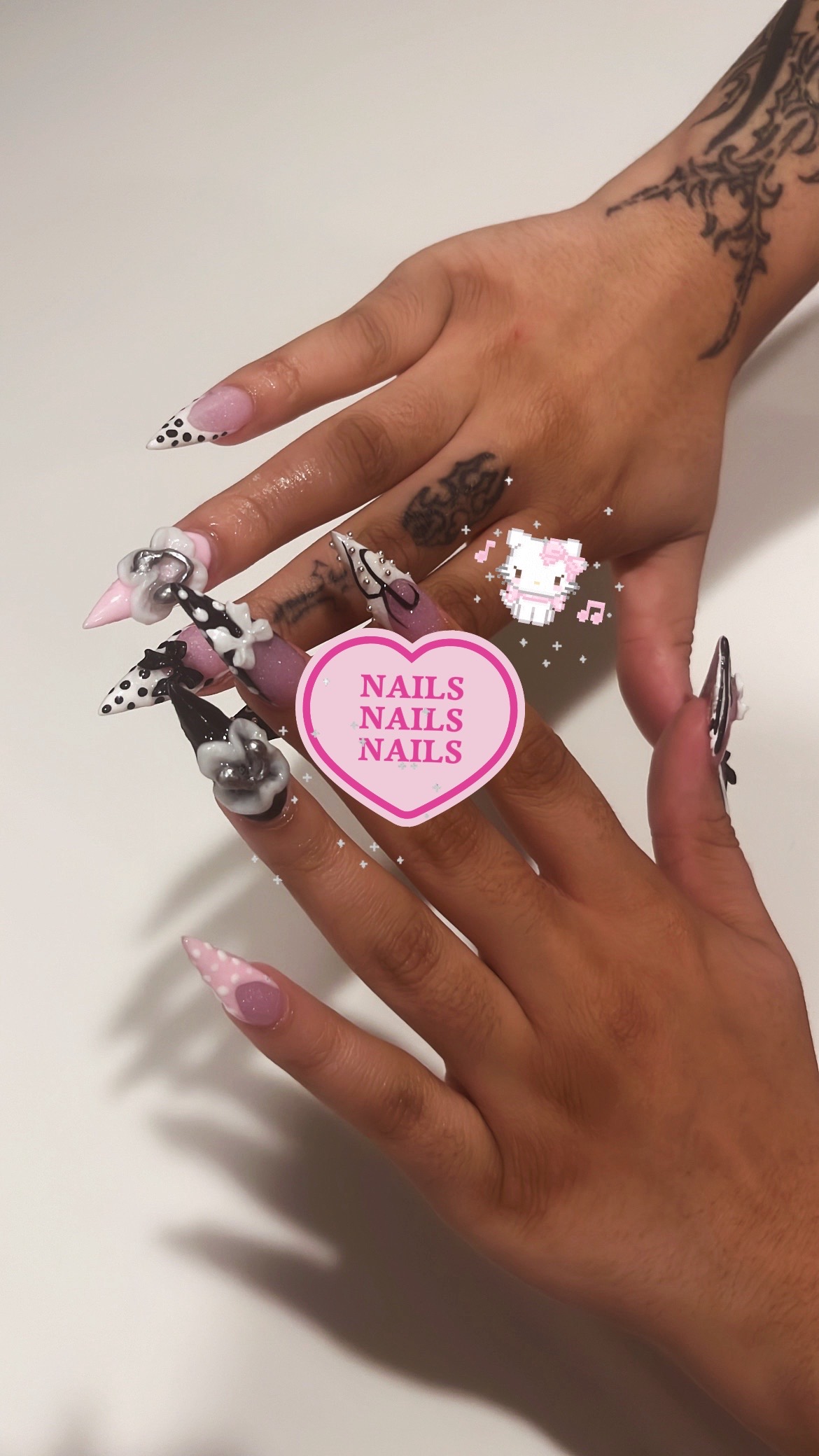 @nailsforangelz